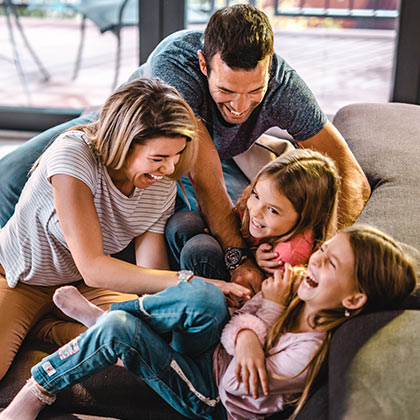 Family smiling and laughing.